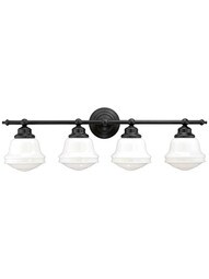 Huntley 4-Light Bath Sconce in Oil-Rubbed Bronze.